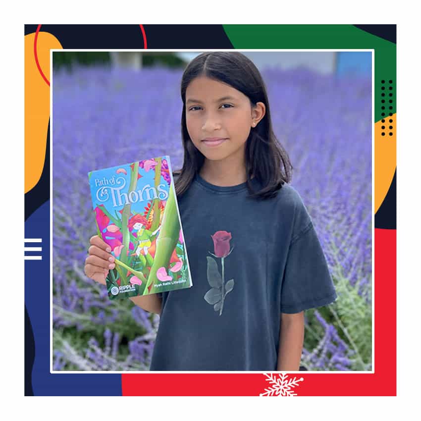 Path of Thorns book held by a young girl in a lavender field, promoting literacy and educational initiatives by Ripple Foundation.
