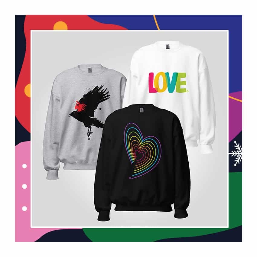 Bird graphic sweatshirt with red splatter on a gray background for awareness, colorful LOVE slogan on a white sweatshirt promoting kindness, and rainbow heart hoodie symbolizing love and inclusivity.